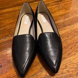 Cole Haan black leather skimmer.